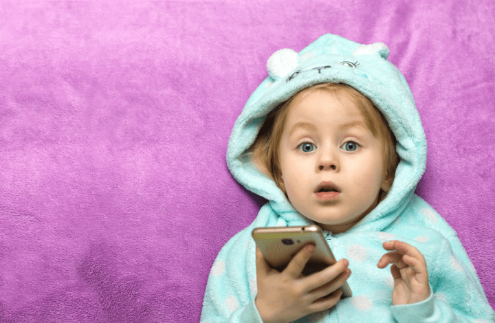 Image of a child on a smartphone