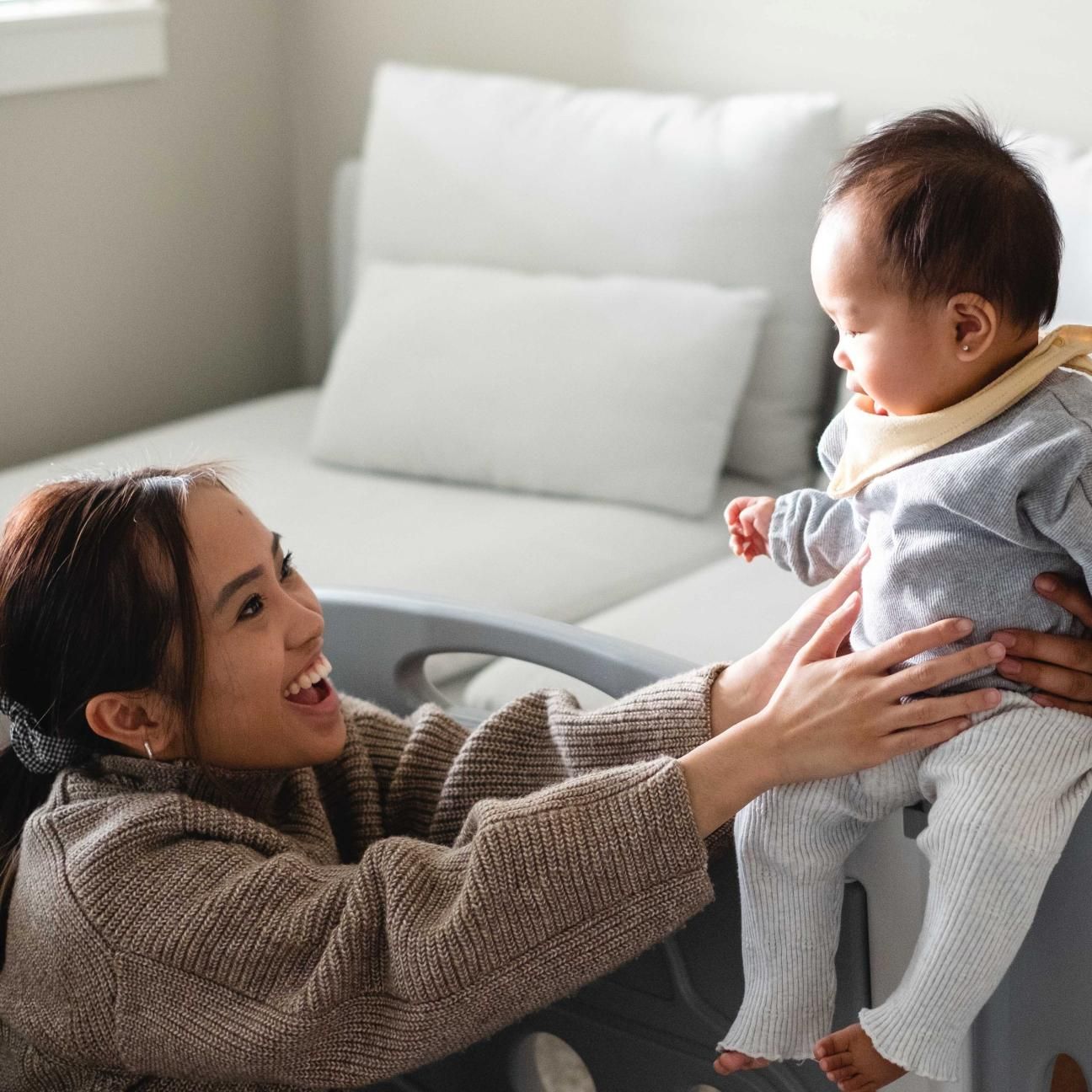 Mother holding her baby