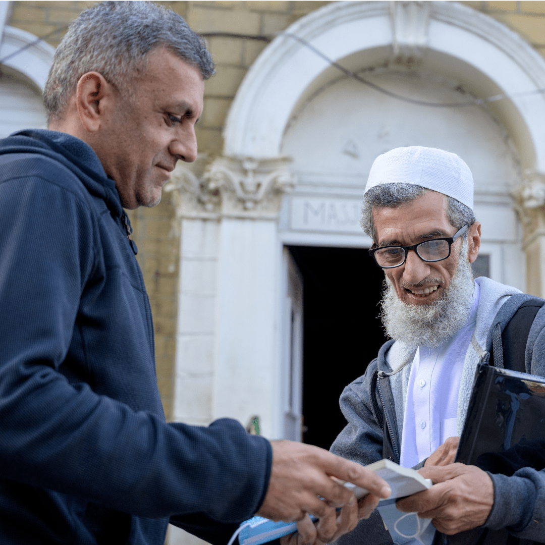Man talking to an Imam