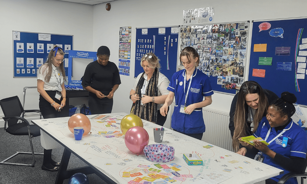 Group of healthcare workers taking part in workshop