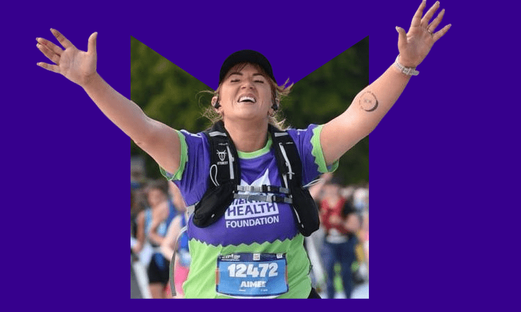 Marathon runner against an M-shaped background