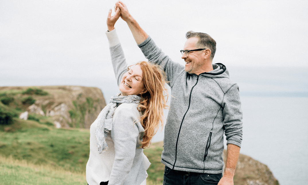 Couple dancing outdoors