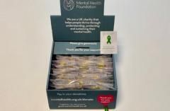 Photo of our enamel green ribbon badges