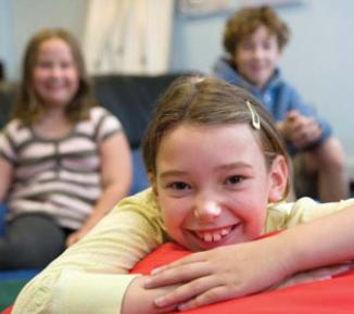 Girl smiling in a room