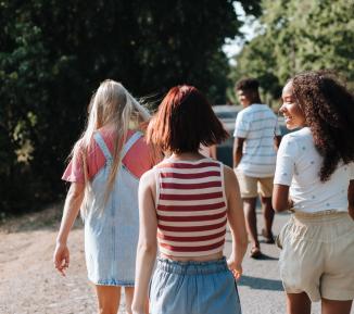 Children and young people walking outdoors