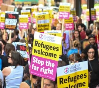 Refugees welcome signs