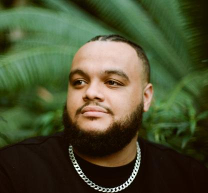 A picture of a person with a green background
