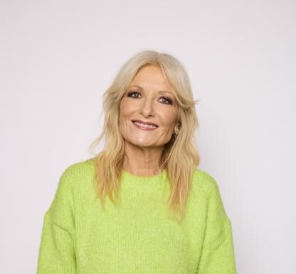 Gaby Roslin wearing green jumper