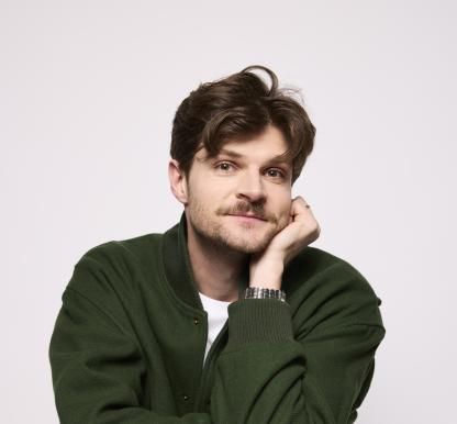 Jim Chapman wearing green jacket