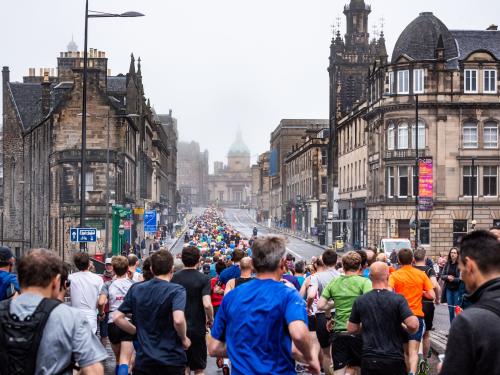Large crowd of runners in a street