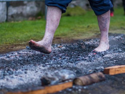 Closeup of someone's feet on the firewalk