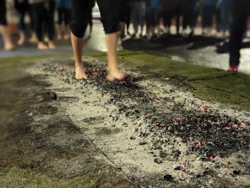 Firewalk showing feet on hot coals