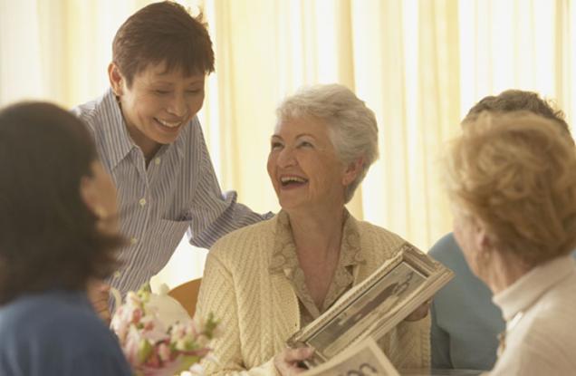 Photo of group of elderly women laughing