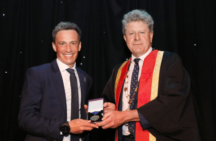 Mark Rowland receiving the President's Medal from the Royal College of Psychiatrists