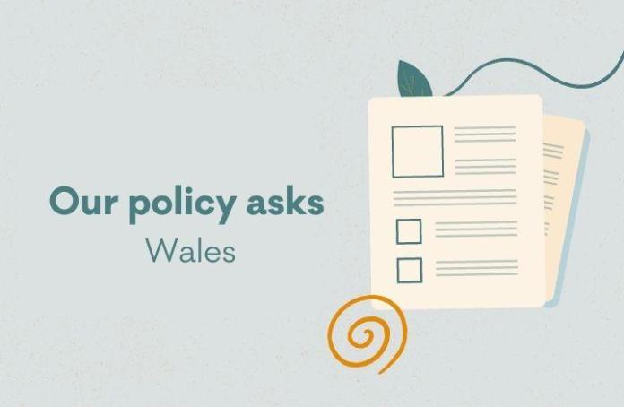 Graphic of some paper and the words 'Our policy asks. Wales'