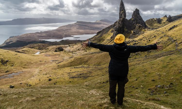 Photo of a person enjoying Scotland's countryside