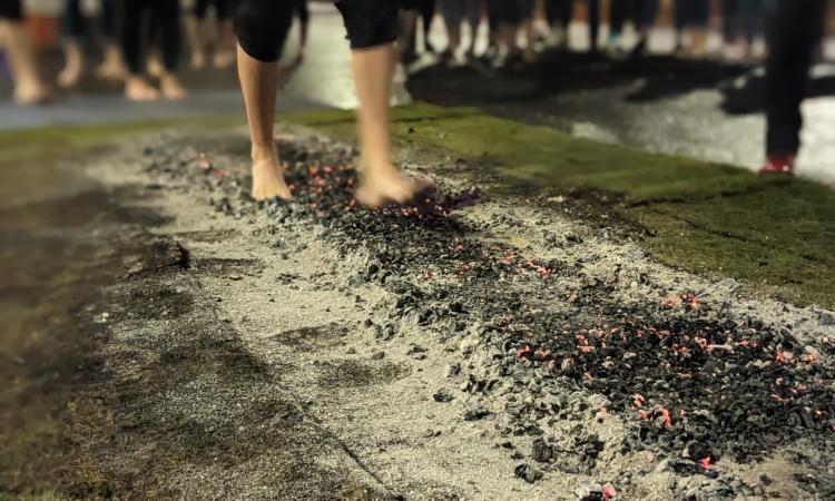 Firewalk showing feet on hot coals