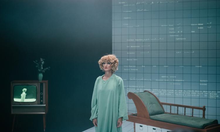 Theatre still - woman alone in a room