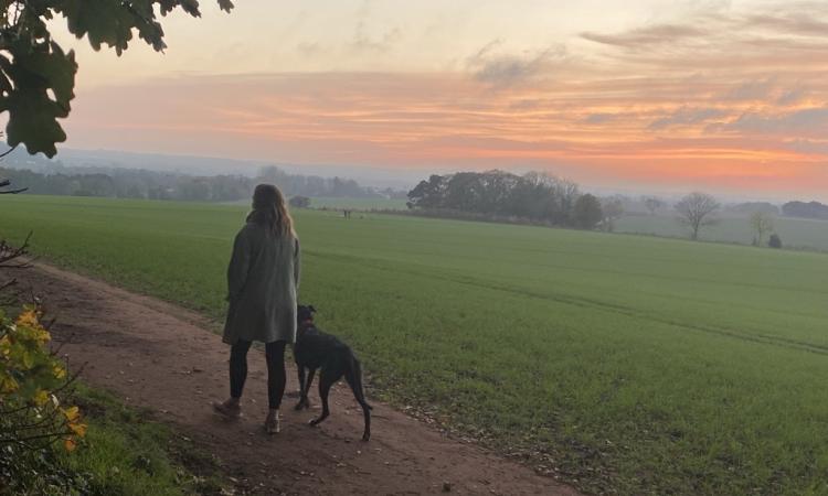Woman walking with her dog