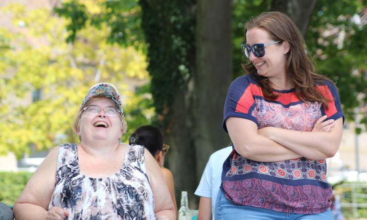 two women laughing 