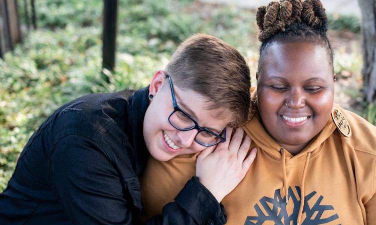 two friends laughing
