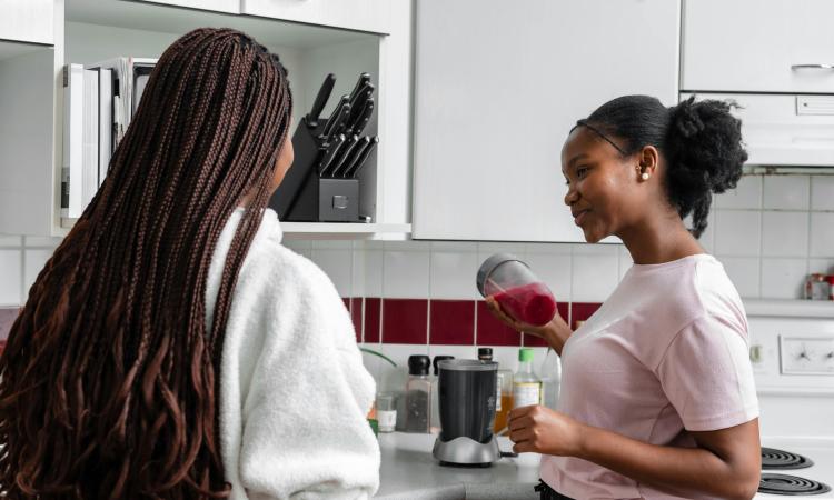 young women in kitchen 