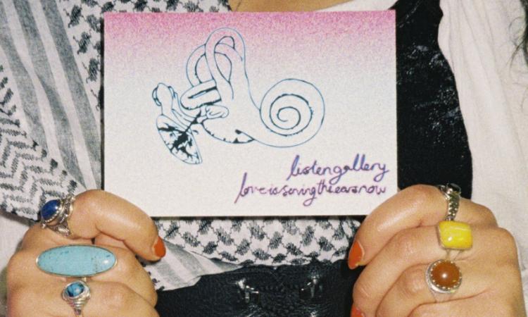 hands holding card