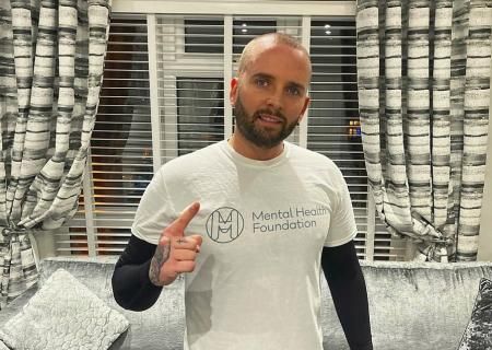 Photo of Taylor in a Mental Health Foundation tshirt