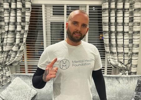 Photo of Taylor in a Mental Health Foundation tshirt