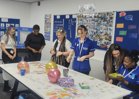 Group of healthcare workers taking part in workshop