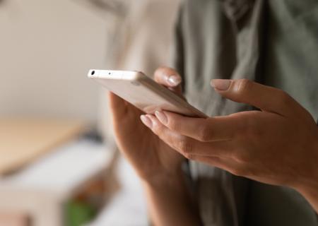 hands holding phone
