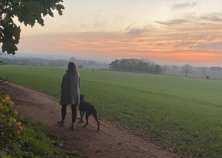 Woman walking with her dog