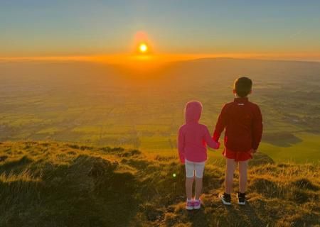 children watching sunset