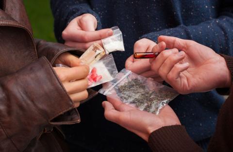 People holding drugs