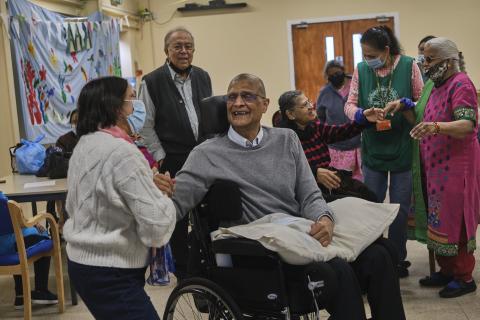 Photo of elderly people talking together