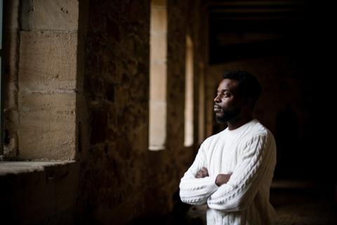 Photo of a man looking thoughtful