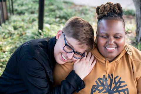 two friends laughing