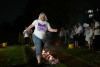Person completing firewalk, London 2025